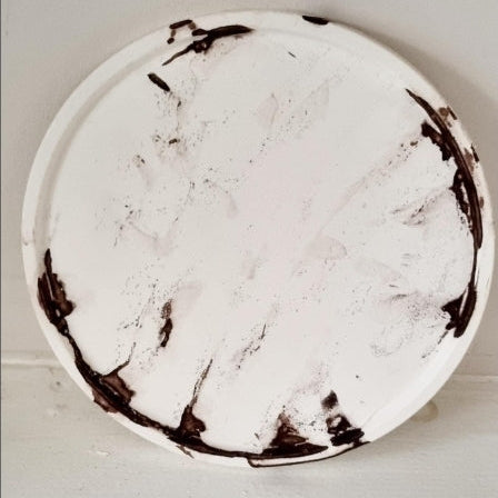 Close up of handmade plaster coasters for candles