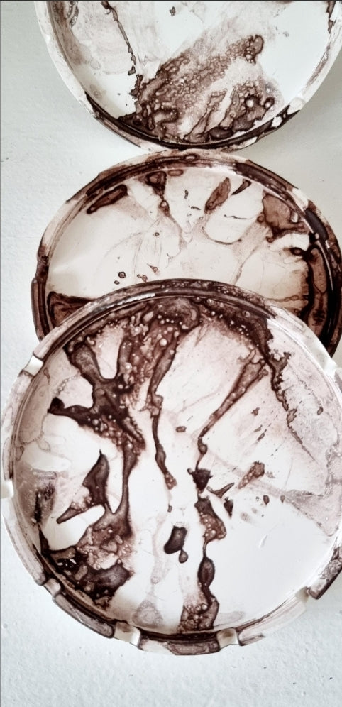 Close up of handmade plaster coasters for candles