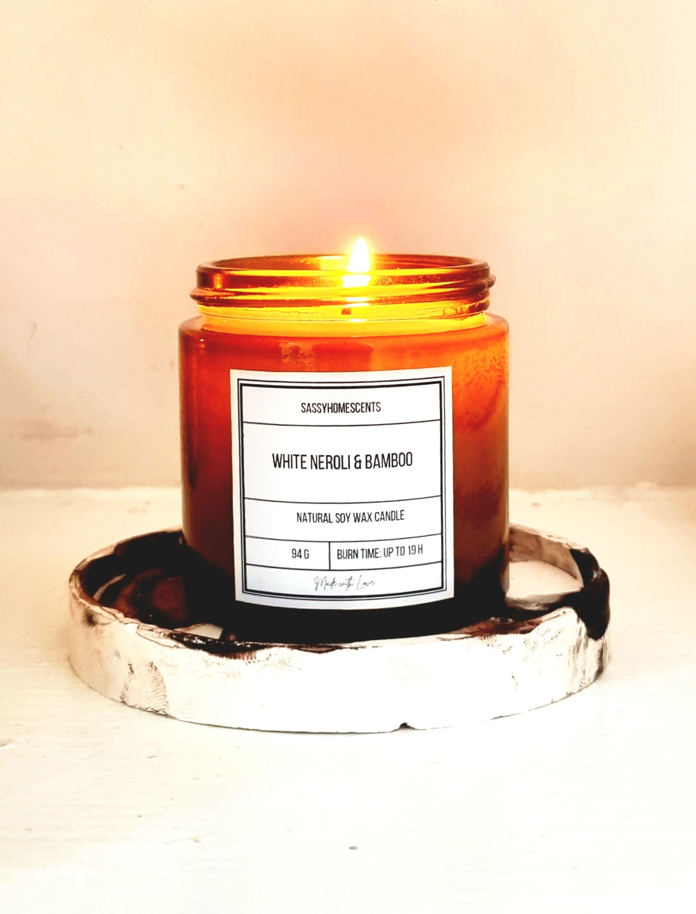 white neroli and bamboo luxury scented soy candle in amber glass jar container