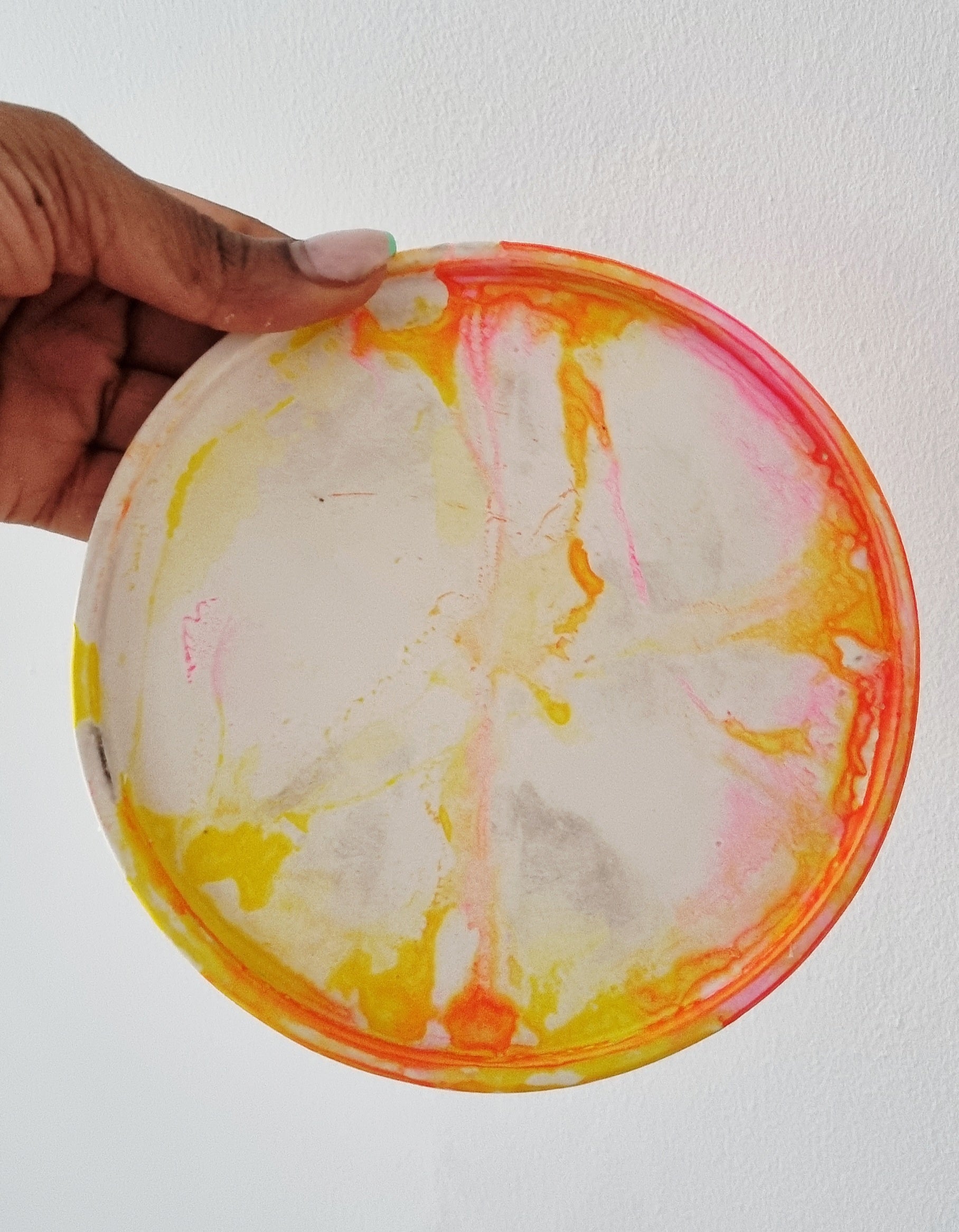 Close up of handmade plaster coasters for candles